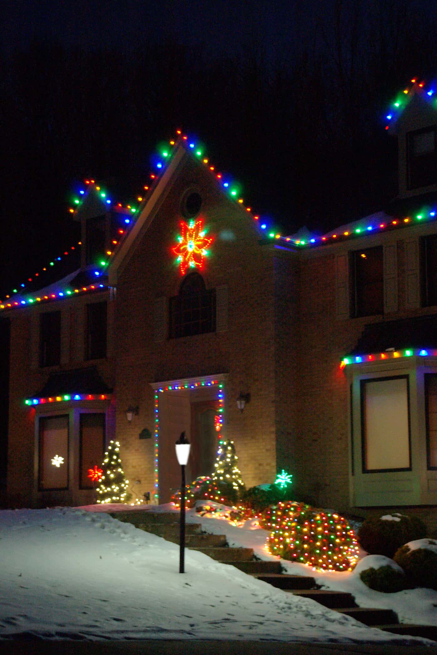 Home with holiday lighting and decorations
